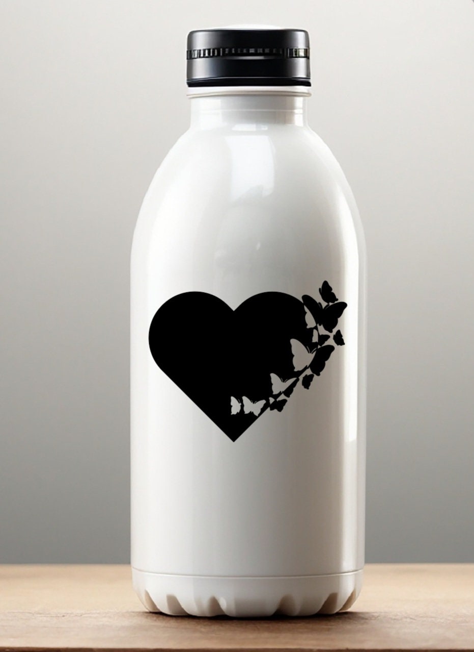 Solid Heart with Butterflies Flying Vinyl Decal Romantic Decal for water bottles, car windows, and computers. Customizable, high-quality outdoor-rated vinyl made in the USA.