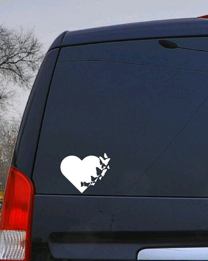 Solid Heart with Butterflies Flying Vinyl Decal Romantic Decal for water bottles, car windows, and computers. Customizable, high-quality outdoor-rated vinyl made in the USA.